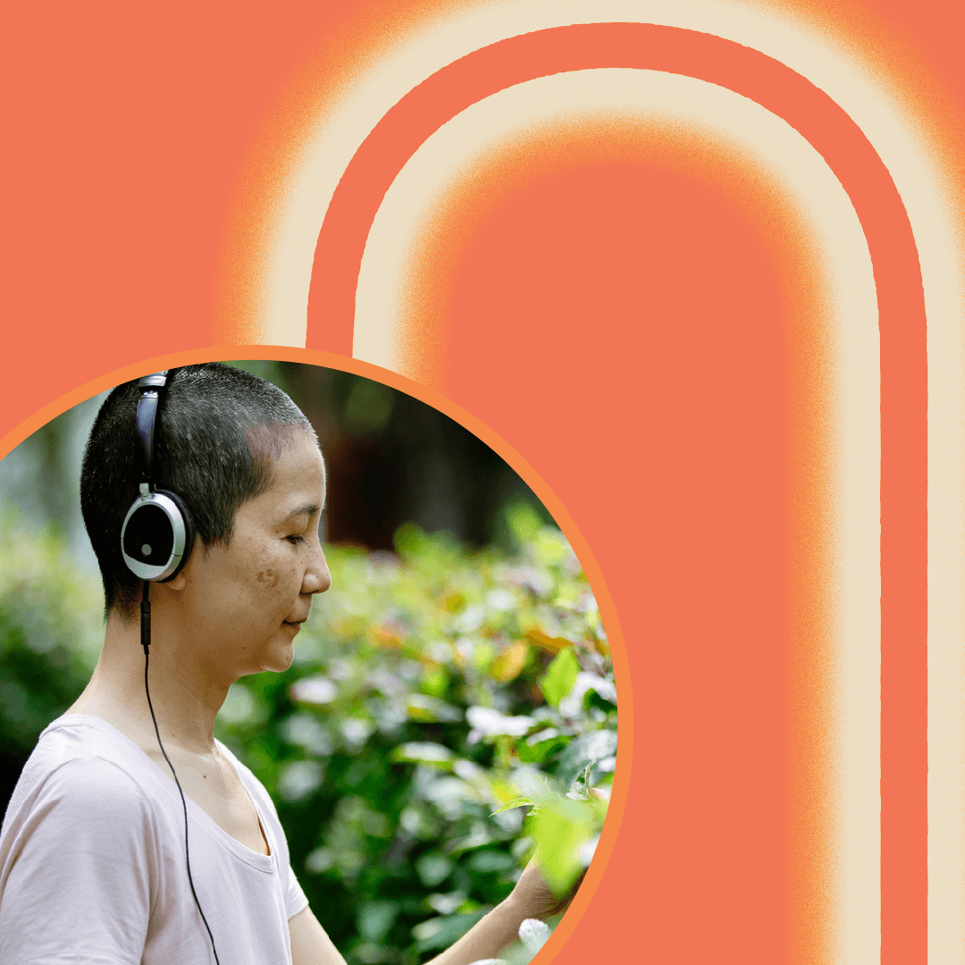 A person with short hair wearing headphones stands outdoors near green plants. The background features an orange graphic with a rounded arch design.
